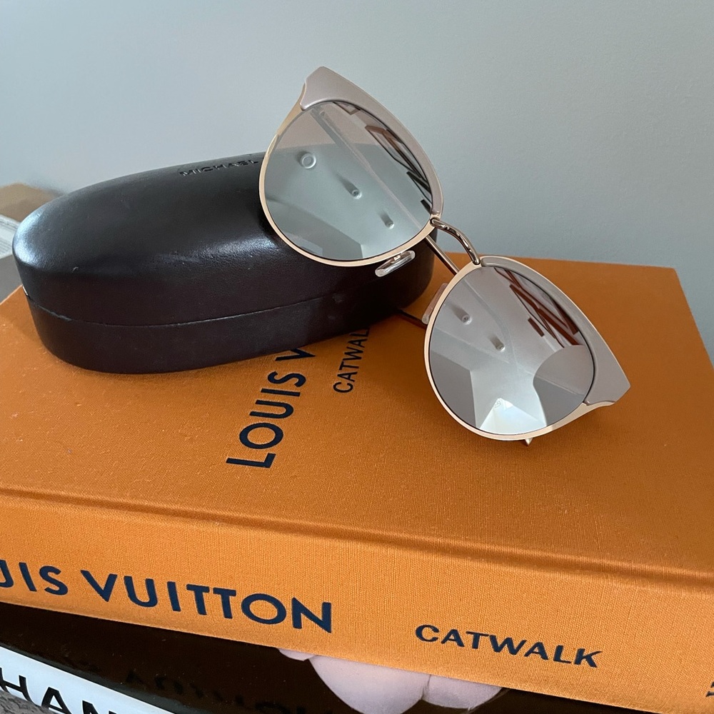 Aldo sunglasses with a Michael Kors case